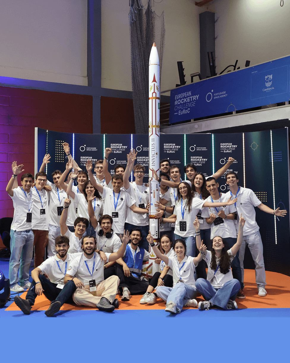 Porto Space Team members standing with their hybrid rocket